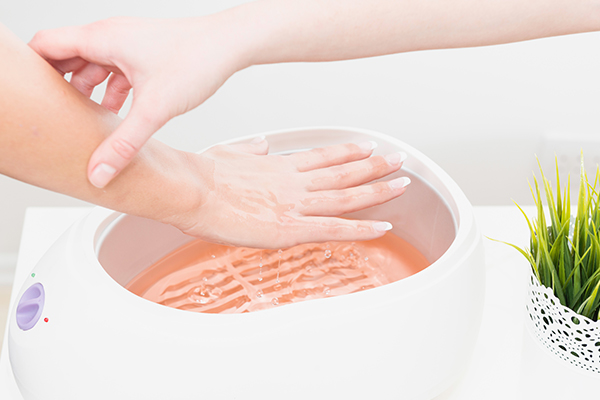 paraffin wax can help manage wrinkled hands