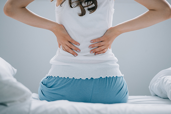 symptoms frequently associated with back pain